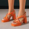 imageAmoji Women 4 Inch Block Heels Platform Cross Strap Chunky Heeled Sandals 3184inchpuorange