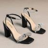 imageAmoji Womens 4 Inch Rhinestone Bowknots Block Heeled Crystal Sandal Ankle Strap Clear Heels 3154inchpublack